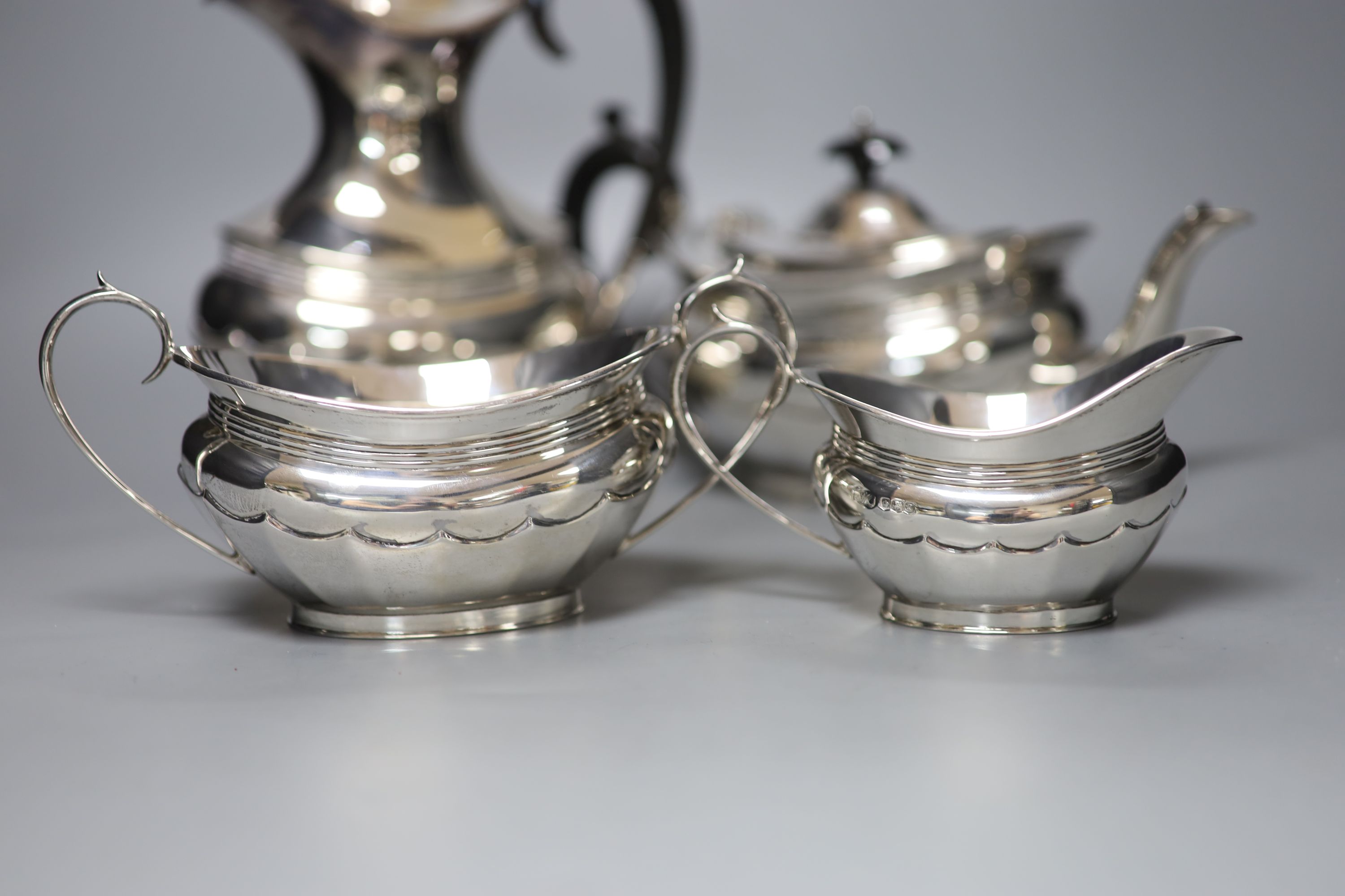 A George V silver four piece oval tea service, R.F. Mosley & Co, Sheffield, 1924 & 1931
